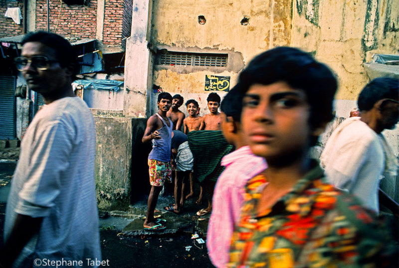 People washing in the street India