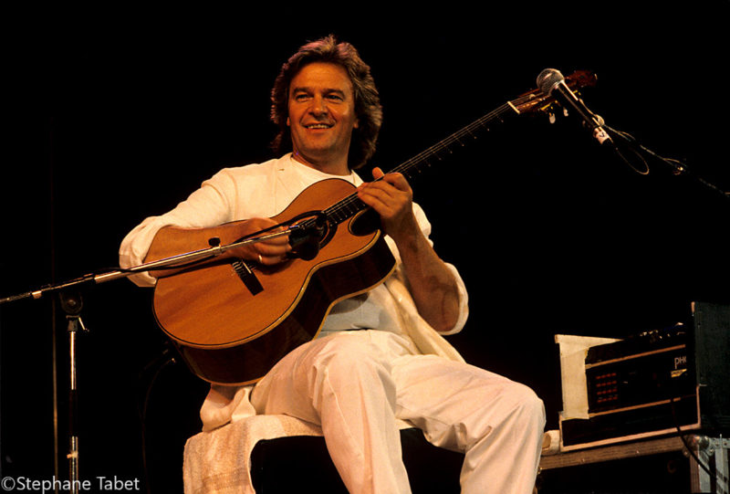 John McLaughlin on stage