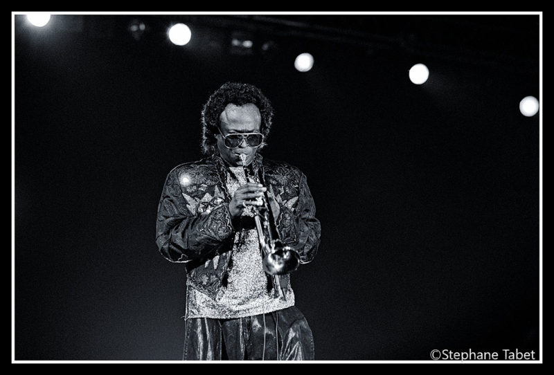 Miles Davis performs onstage